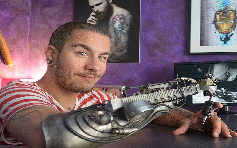 Jc Sheitan Tenet, Tatoueur, Prothèse